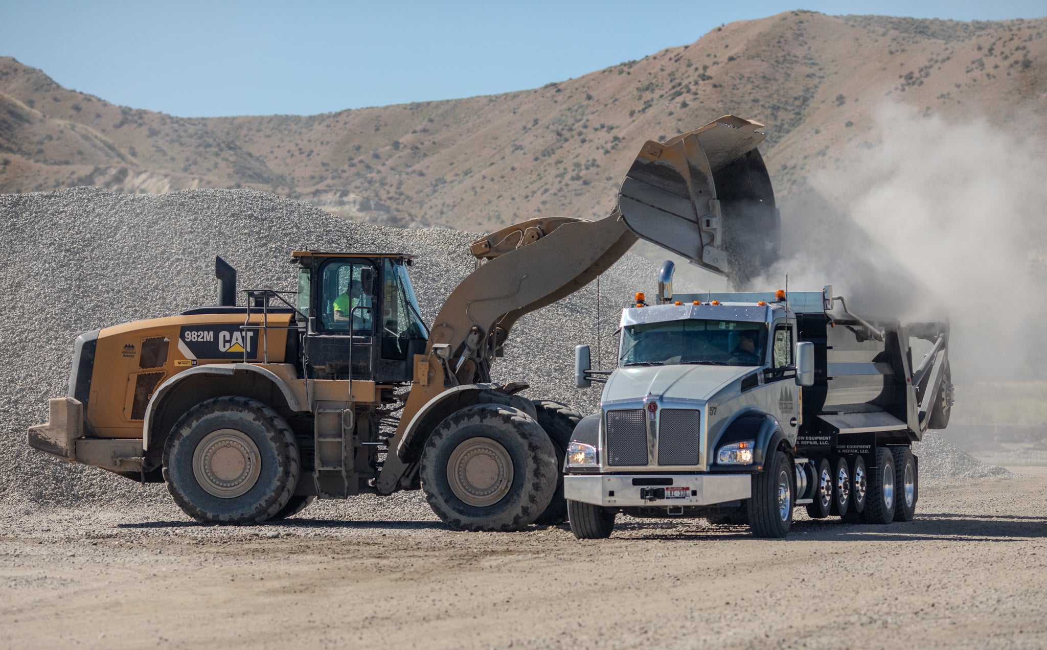 loading rock into a truck